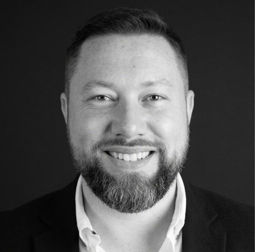 Black-and-white portrait of Dan Lawellin